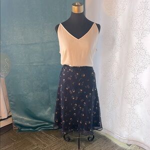Navy blue chiffon skirt with floral pattern.